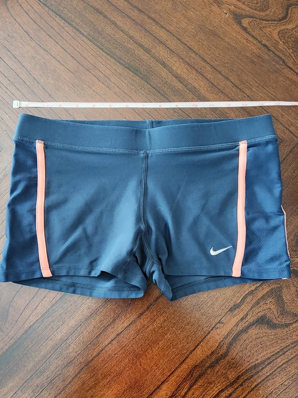 Nike Women's Dark Blue Bike Shorts with Coral Side Stripes